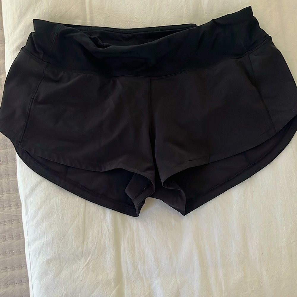 Black Lululemon shorts, pocket in the back, and an adjustable waistband.